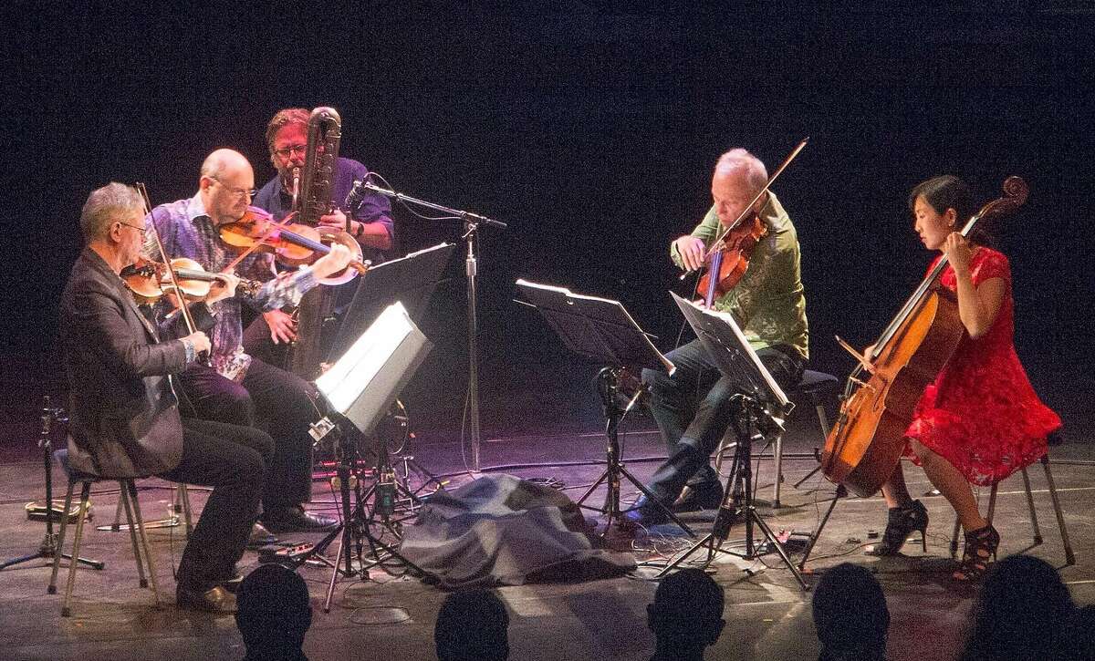 The musician Ralph Carney sits in with the Kronos Quartet