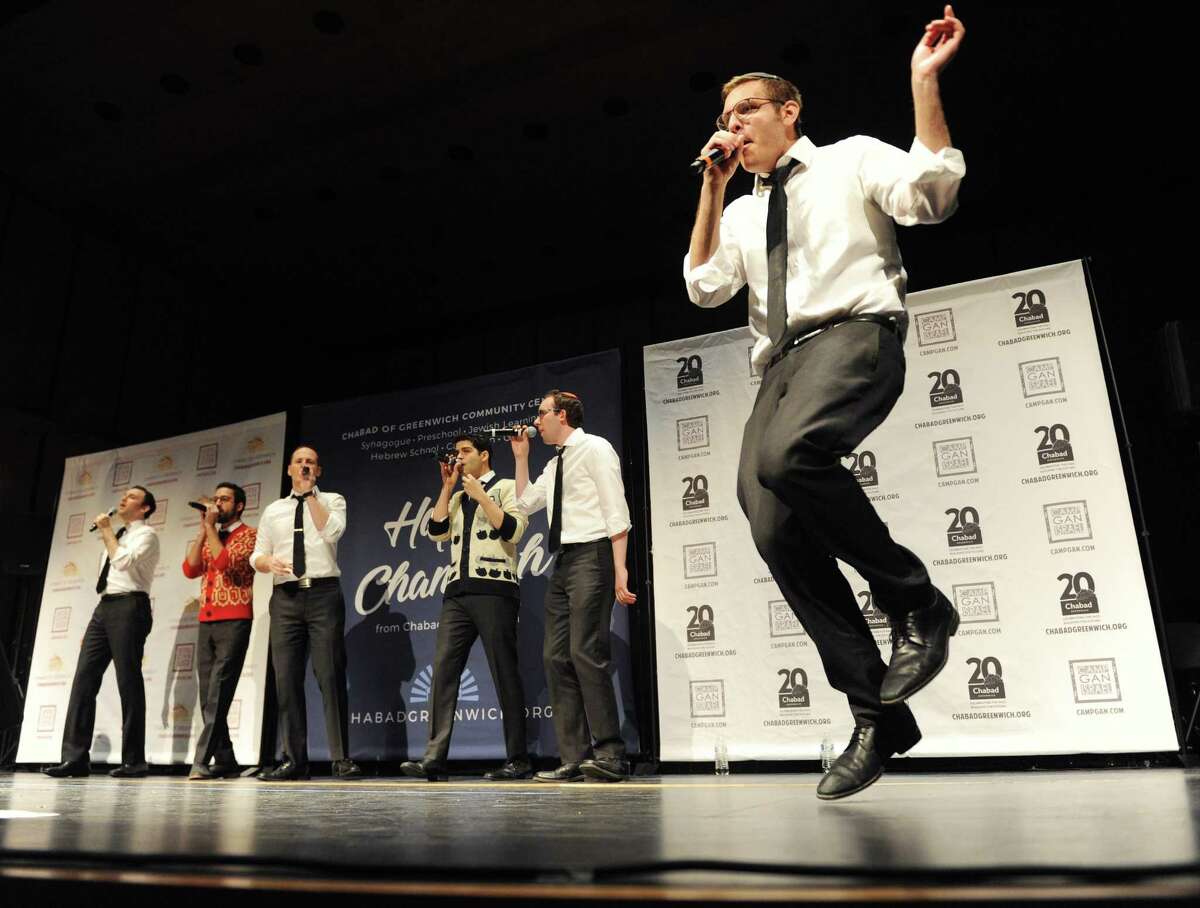 The Maccabeats perform at the Chanuka Concert presented by Chabad of Greenwich Community Center at Greenwich High School in Greenwich, Conn. Sunday, Dec. 17, 2017. The Jewish a cappella group The Maccabeats headlined the show with an entertaining array of holiday and pop music. Carmel Academy's Angels & Prophets also performed a set and Rabbi Yossi Deren lit the menorah with First Selectman Peter Tesei.