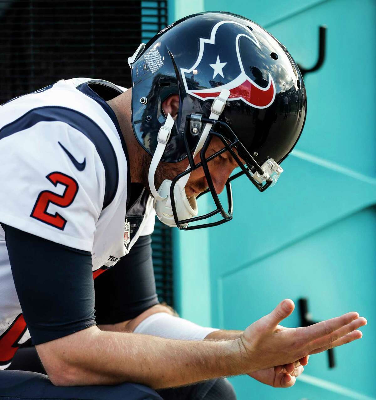 Houston Texans quarterback T.J. Yates (2) sits on the bench during the fourth quarter of the Texans 45-7 loss to the Jacksonville Jaguars during the fourth quarter of an NFL football game at EverBank Field on Sunday, Dec. 17, 2017, in Jacksonville.