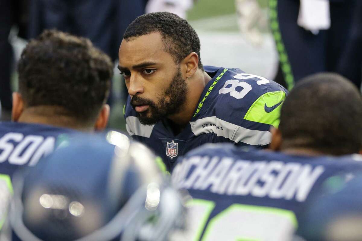 Seahawks wide receiver Doug Baldwin talks with quarterback Russell Wilson and wide receiver Paul Richardsond as their loss to the Rams becomes a reality during the second half of a football game at CenturyLink Field on Sunday, Dec. 17, 2017.