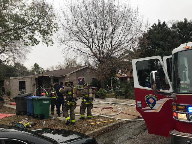 Firefighters putting out fire in East Side home save family’s Christmas