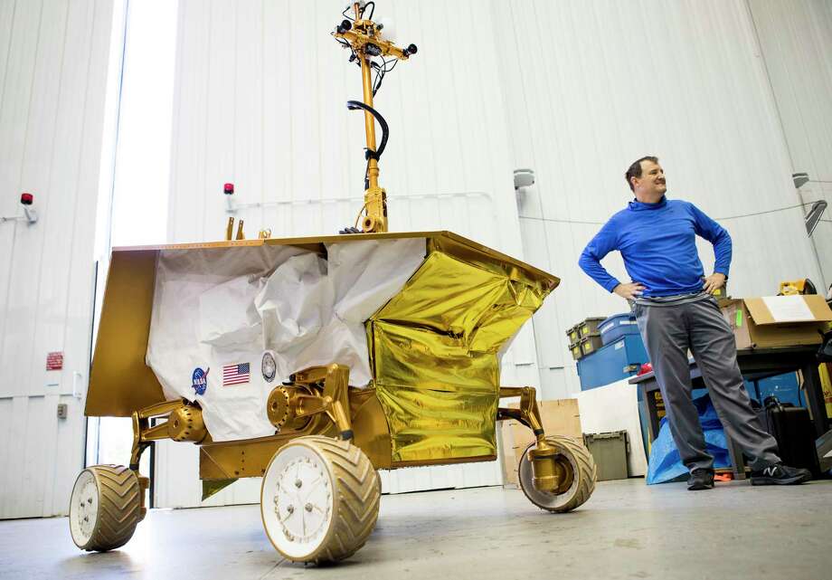   Bill Bluethmann, PhD, talks about the 2015 Rover Protector Robot Prototype (RP15) at the Johnson Space Center on Thursday, November 30, 2017, in Houston. The robot is designed to drill in the crust of the moon in search of water. Photo: Brett Coomer, Houston Chronicle / © 2017 Houston Chronicle 