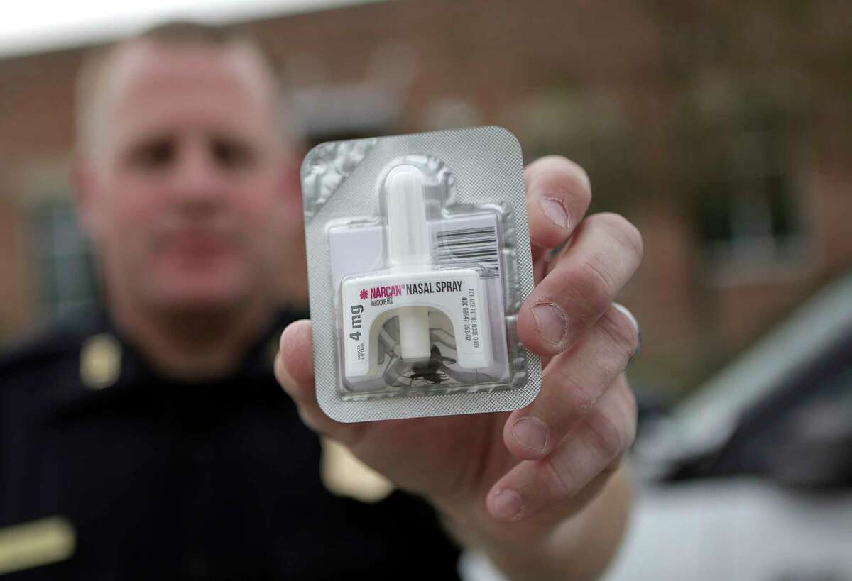 Josh Bruegger, assistant chief of police with Pasadena, posing with Narcan, a drug used in the case of an opioid overdose, on Wednesday, Dec. 13, 2017, in Pasadena After the first of the year, Pasadena's patrol units will have the drug on hand. ( Elizabeth Conley / Houston Chronicle )