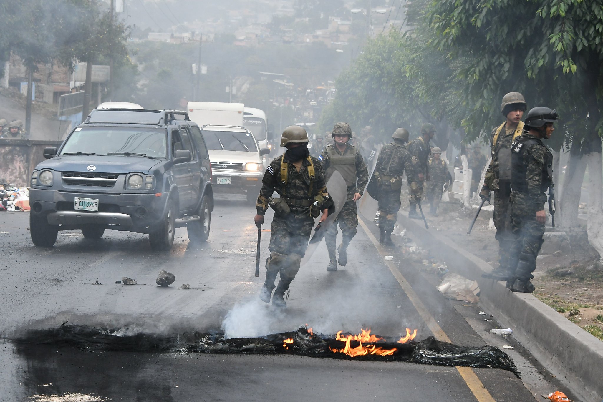 Protests spread in Honduras after panel rules president won election