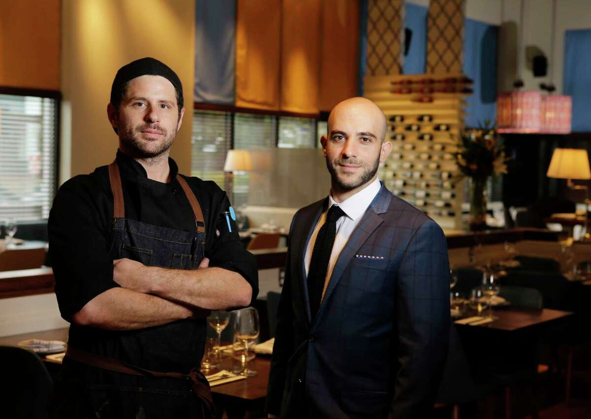 Doris Metropolitan in River Oaks is helmed by chef Sash Kurgan, left, and owner Itai Ben Eli.