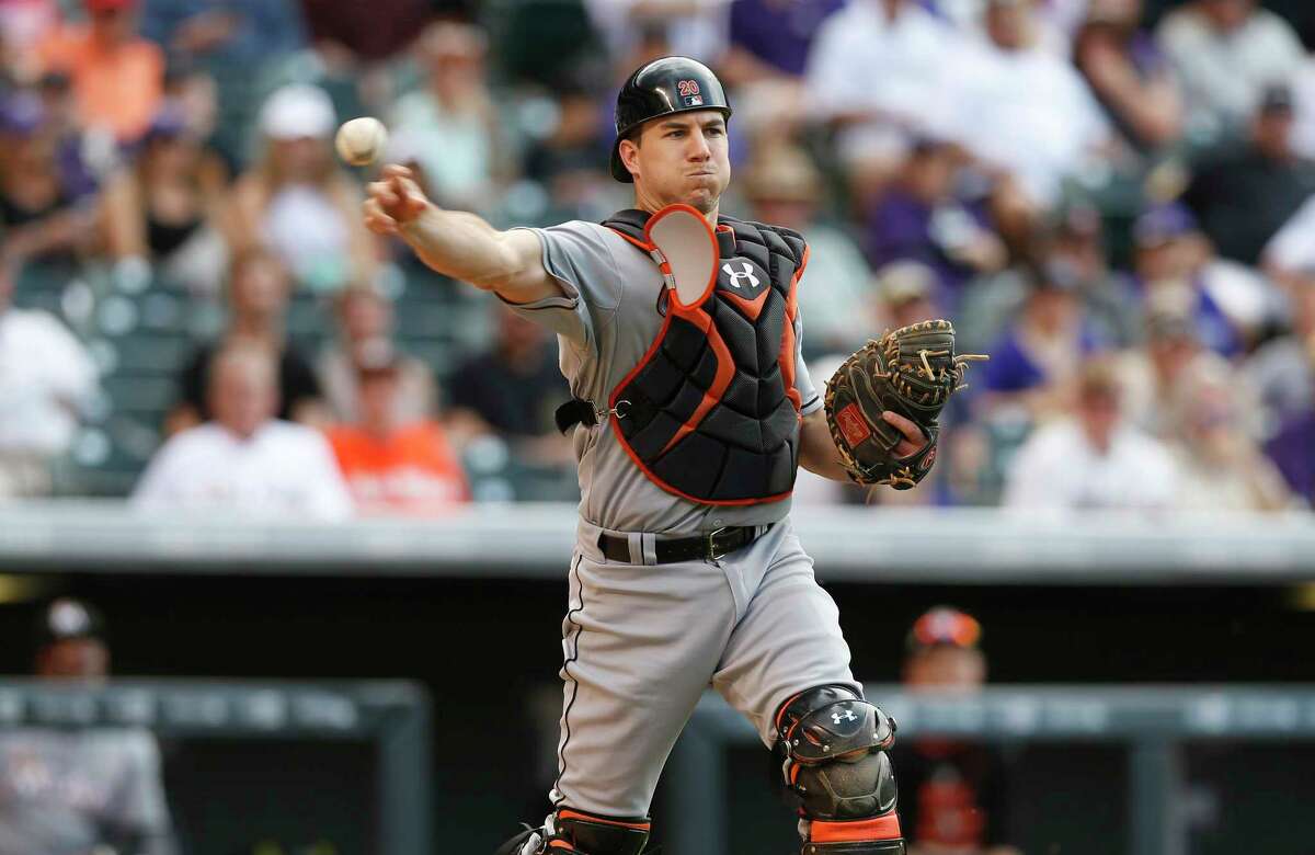 J.T. Realmuto of the Miami Marlins prepares to take the field during