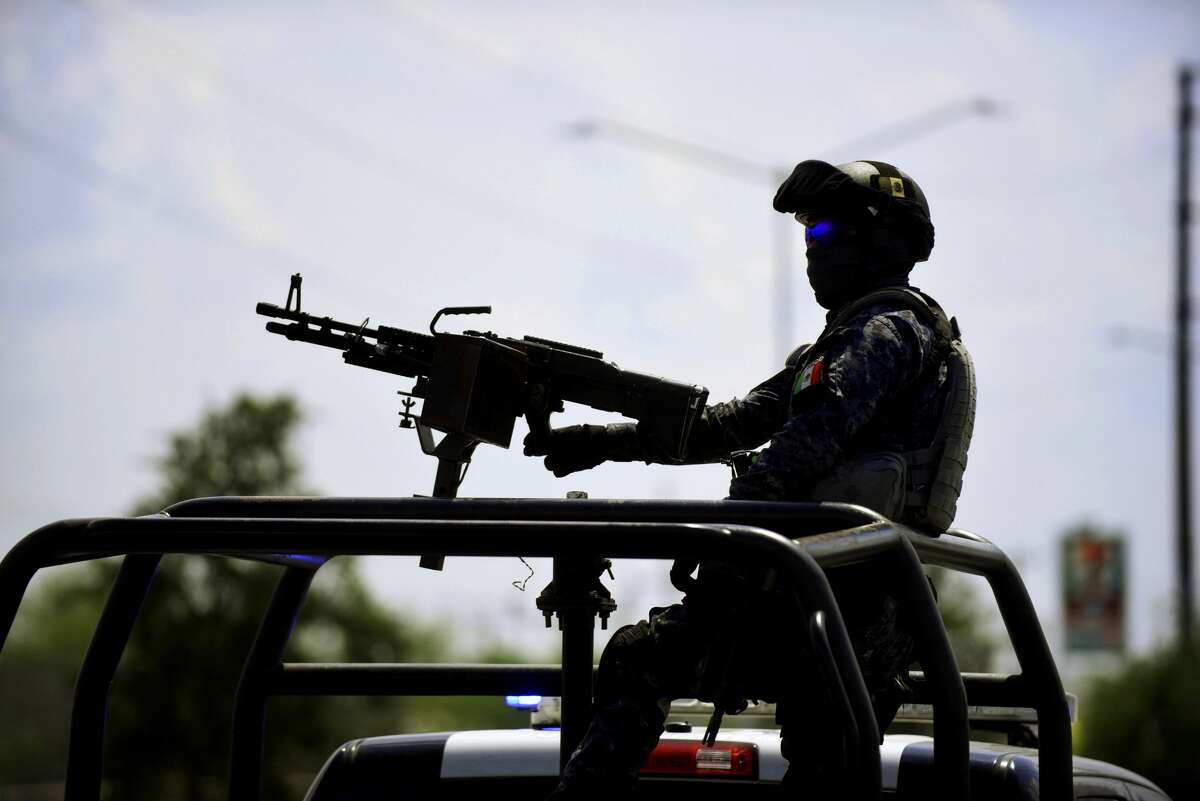 A Mexican federal police officer mans an automatic weapon during a patrol in Reynosa, one of the most dangerous cities in Mexico, where drug cartels battle each other for dominance over trade routes to the United States. Friday, May 12, 2017.