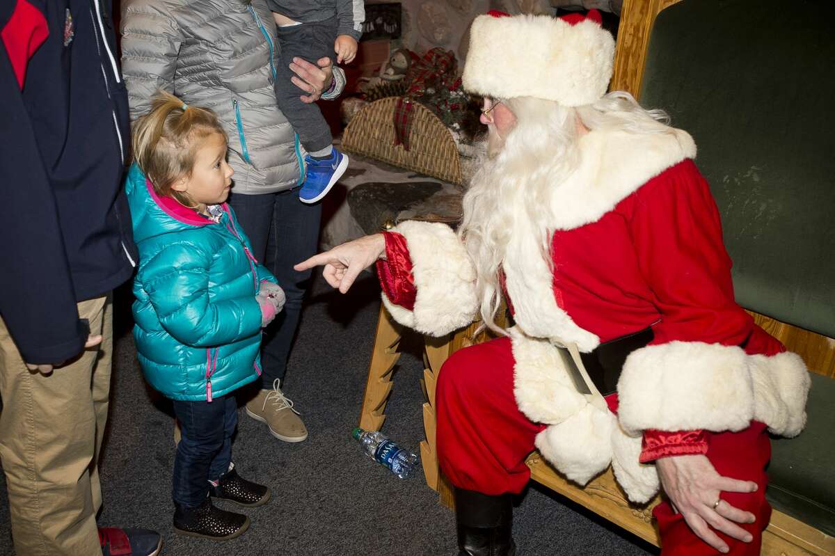 Children and families visit Santa Claus on Saturday, Dec. 16, 2017 at the Santa House in Midland. (Katy Kildee/kkilde@mdn.net)