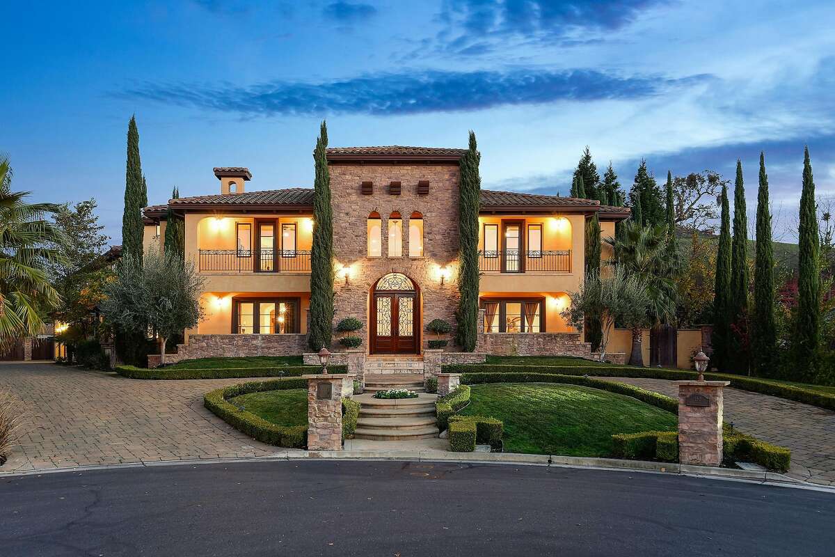 Tuscan style radiates throughout expansive Alamo home