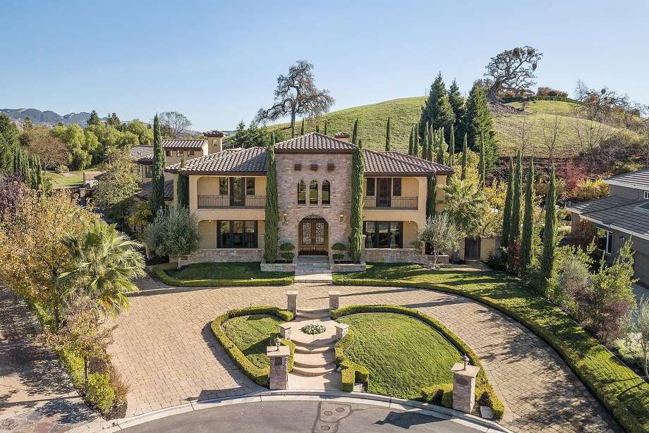 Tuscan style radiates throughout expansive Alamo home