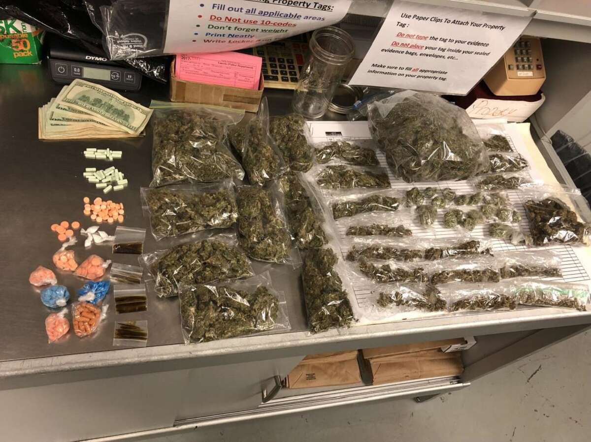 Authorities said they seized approximately 5 pounds of marijuana, 1 gram of cocaine, 9 grams of Xanax, 271 pills of Adderall, 5.3 grams of cannabis wax and $500.