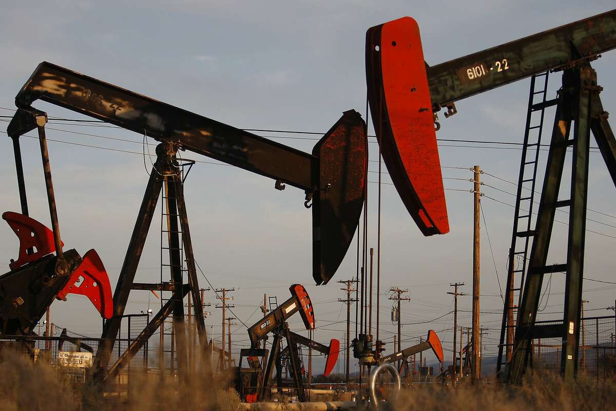 Pump jacks and wells are seen in March 2014 in an oil field near McKittrick (Kern County) where hydraulic fracturing, or fracking, is used.