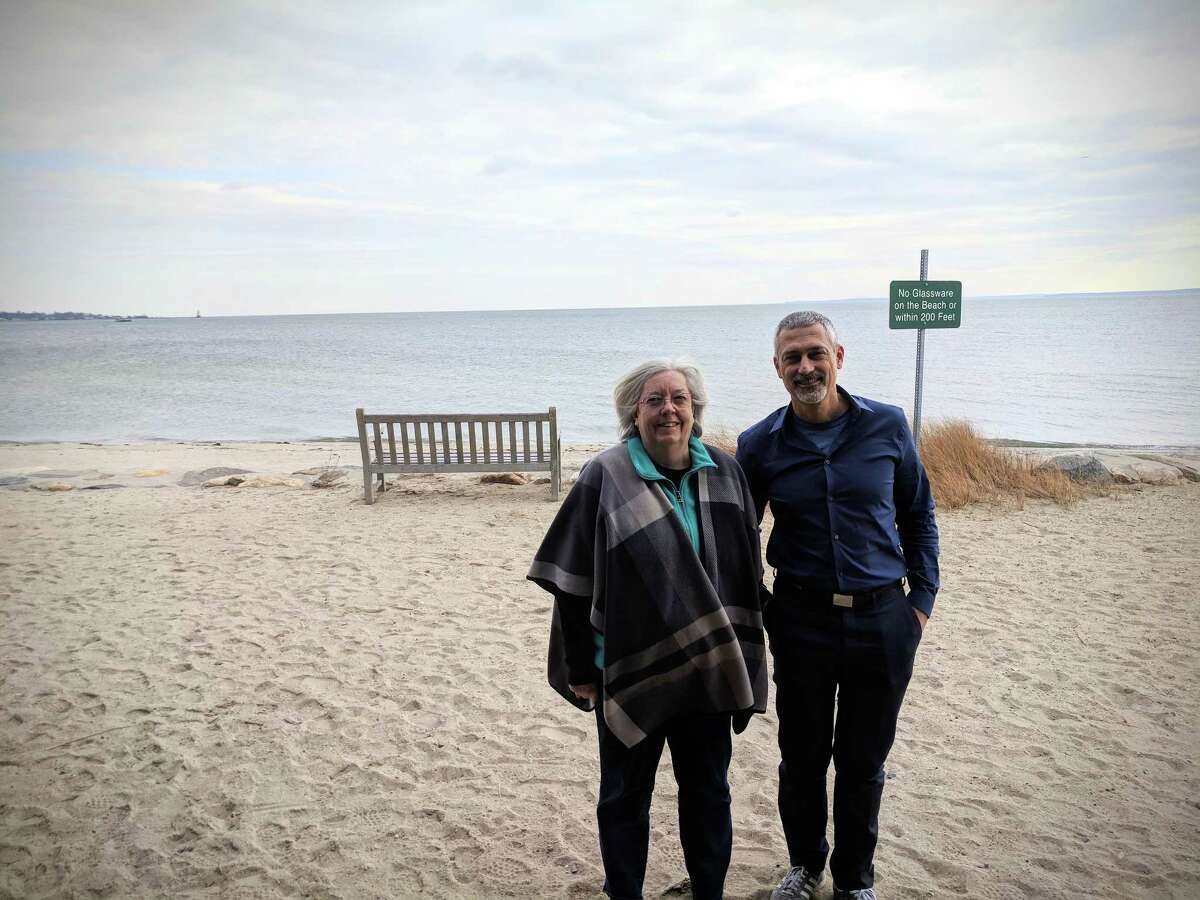 Greenwich Conservation Director Denise Savageau and Houseal Lavigne Senior Associate Andrew Vesselinovitch outside Innis Arden Cottage at Tod's Point during the Tuesday morning bus tour which marks the beginning of a journey toward coordinating and finalizing the Plan of Conservation and Development.