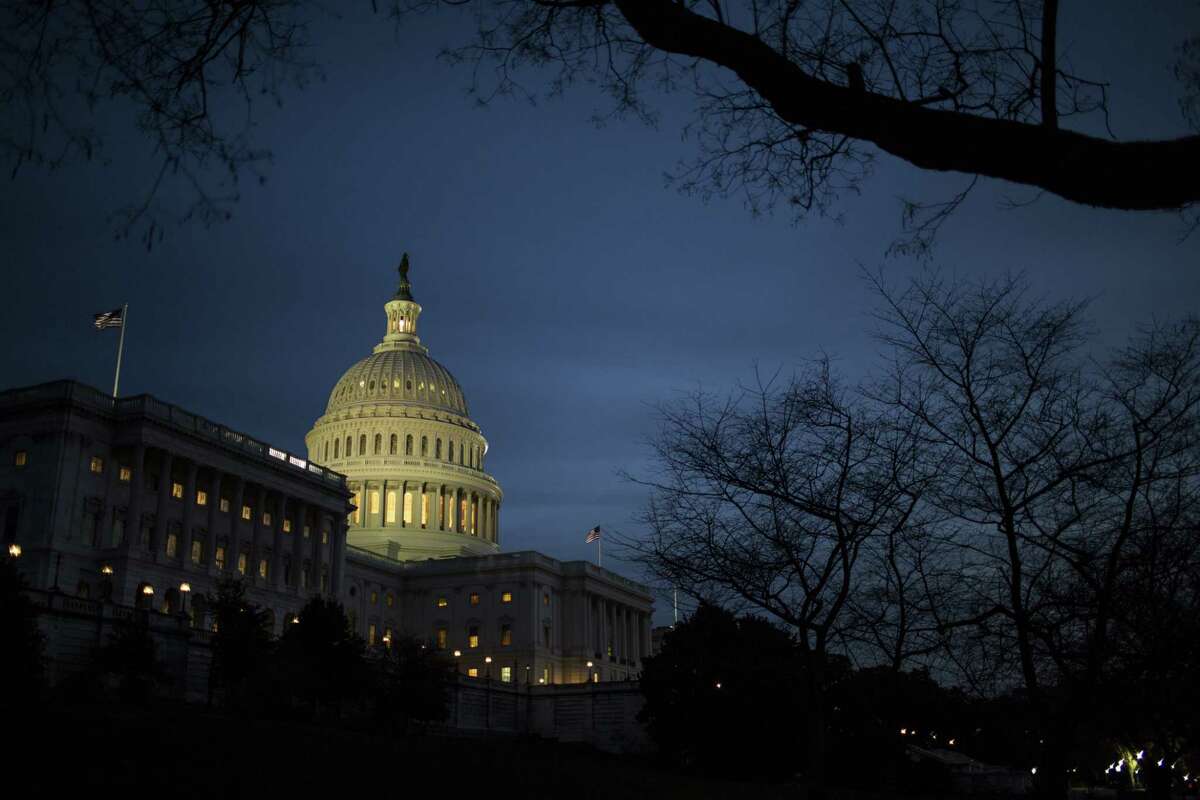 The U.S. Capitol building stands in Washington, D.C., on Tuesday, Dec. 19, 2017. Photographer: Zach Gibson/Bloomberg