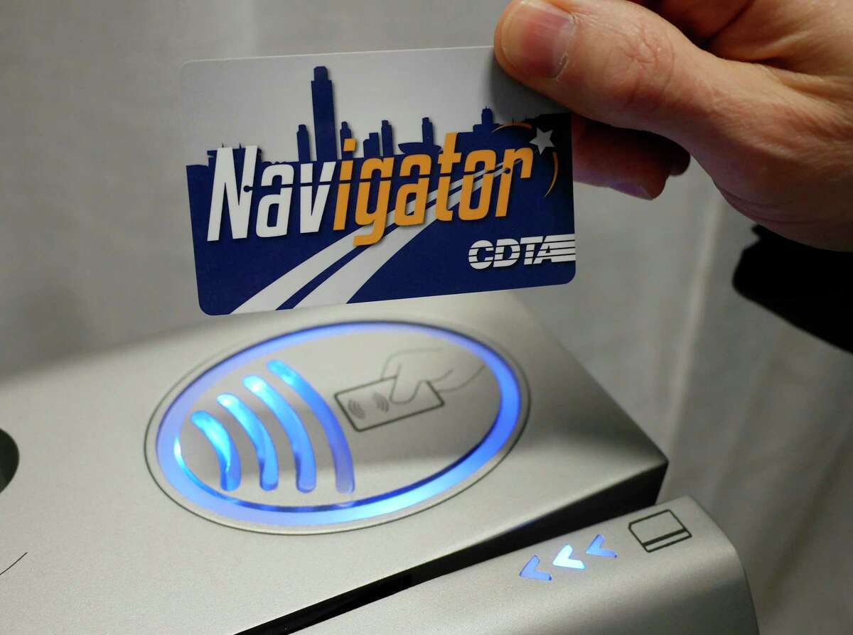A CDTA Navigator smart card is held above the reader on a fare box during an event to launch the Navigator program to the public on Thursday, Jan. 12, 2017, in Albany, N.Y. Riders using the smart card will place the card onto the reader to pay for fares. (Paul Buckowski / Times Union)