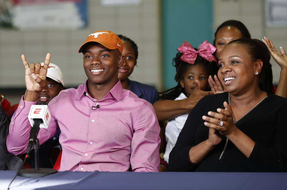 Anthony Cook of Lamar, one of the state's top football recruits, makes his announcement that he will be attending The Univeristy of Texas during a live televised announcement at Lamar High School, Wednesday, Dec. 20, 2017, in Houston. ( Karen Warren / Houston Chronicle )