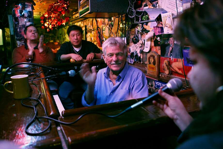 Rod Dibble claps in approval after accompanying a singer on the piano in 2011. Photo: Alex Washburn / The Chronicle