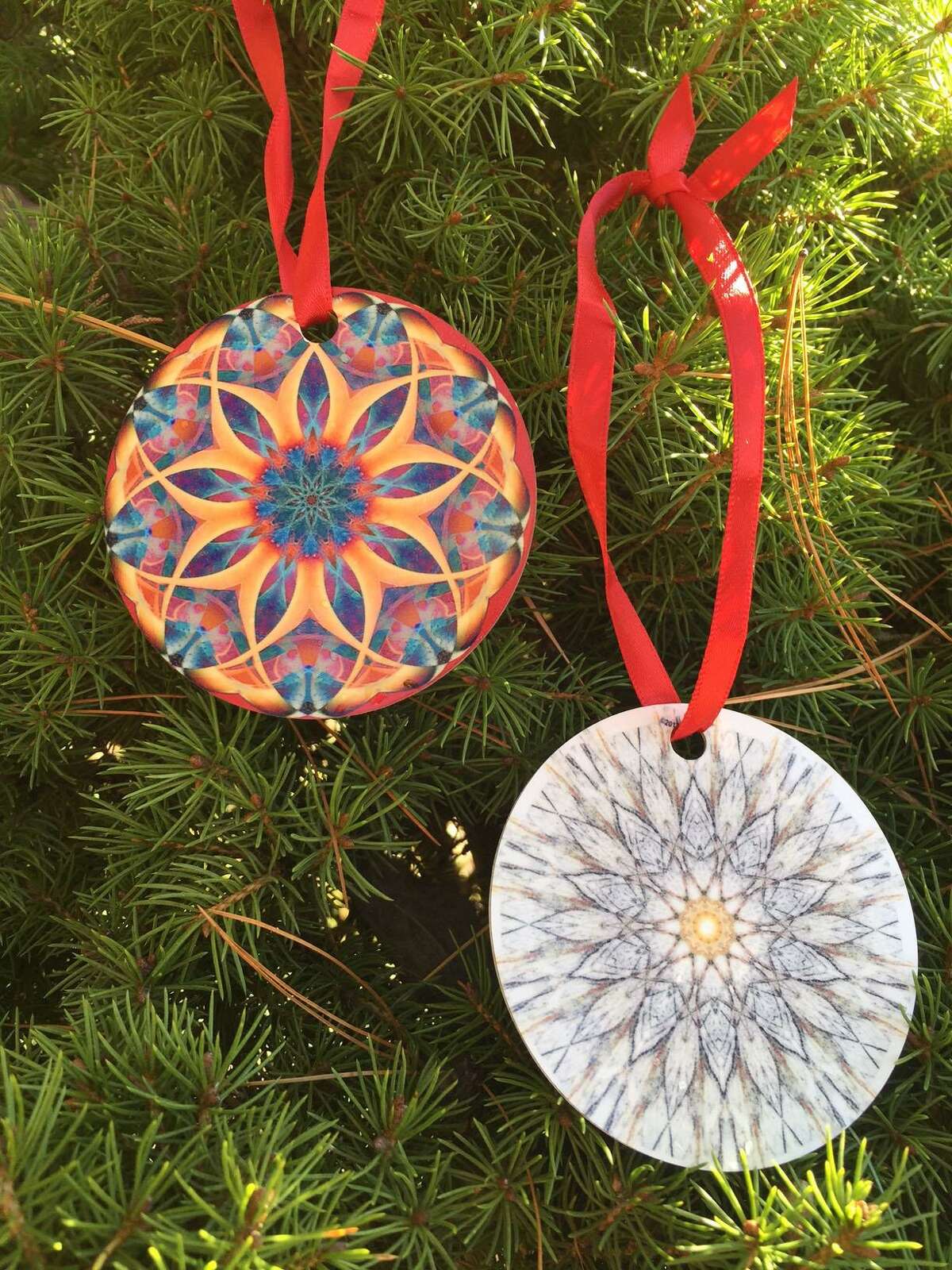 Sherman Library in Sherman Center is exhibiting a holiday show featuring photographs by Barbara Soares and Jim Stasiak through Jan. 25. Above are ornaments by the artists.