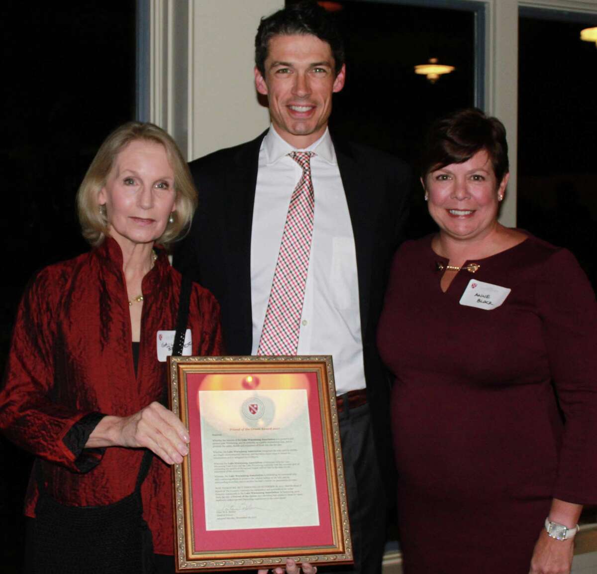 The Gunnery in Washington recently hosted a town party and presented its Friend of the Green Award to the Lake Warmarug Association. Peter Becker, head of school, center, presented the award to association co-presidents Gail Berner, left, and Anne Block.