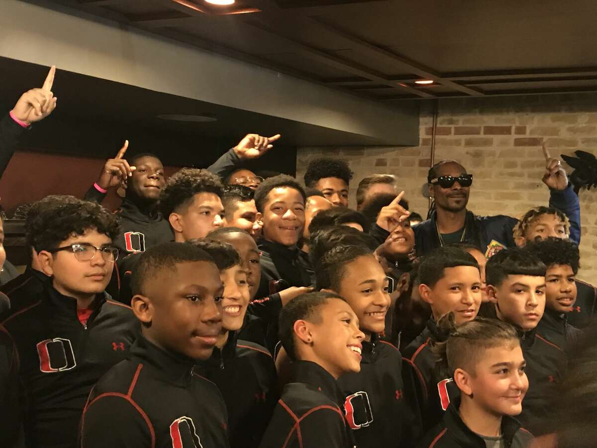 Snoop Dogg stopped by Smoke BBQ Brew Venue to congratulate the San Antonio Outlaws for winning the national championship in the Snoop Youth Football League.