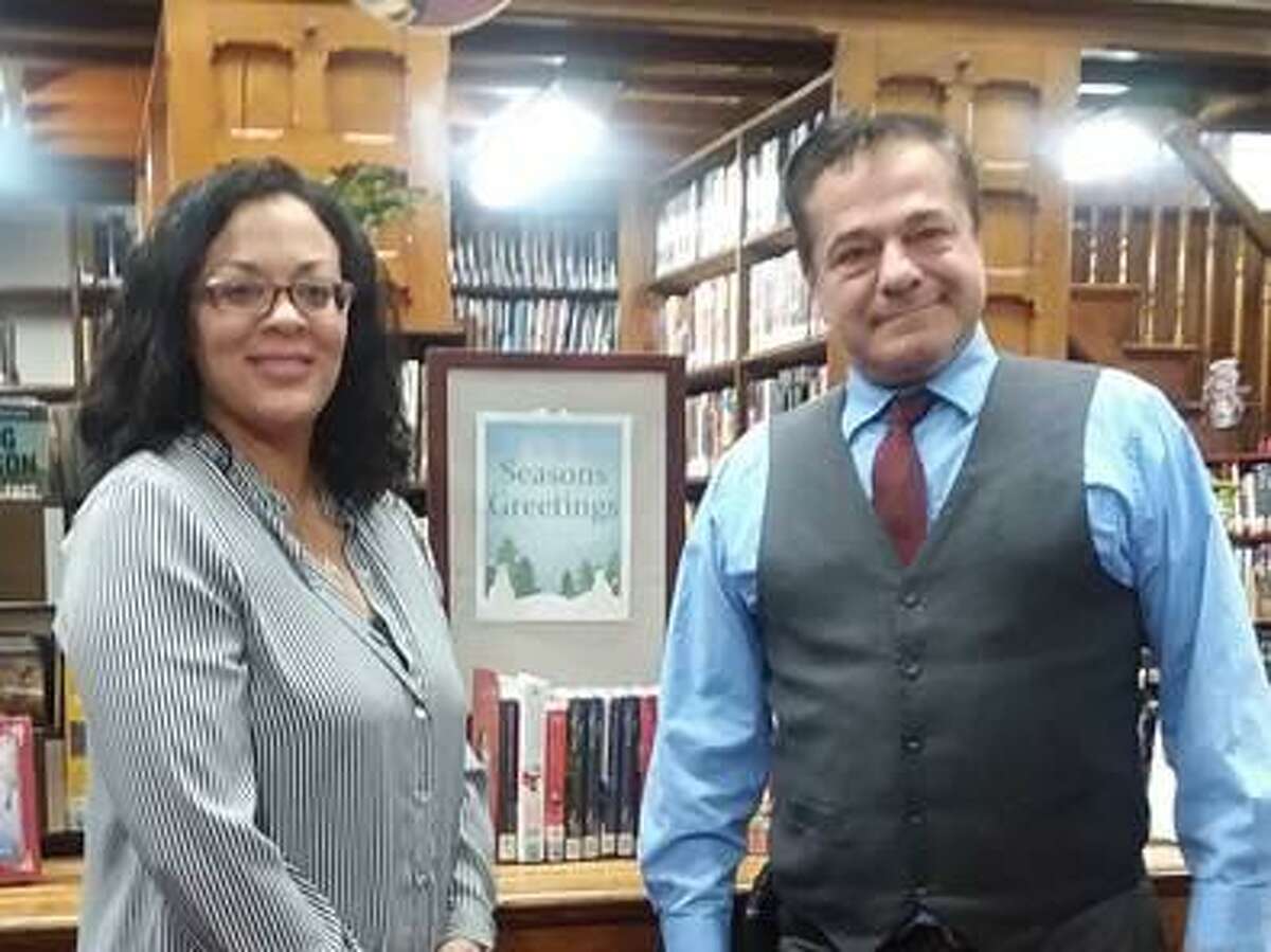 New Library Director Jennifer Lester, left, and Ansonia Mayor David Cassetti are photographed at the library.