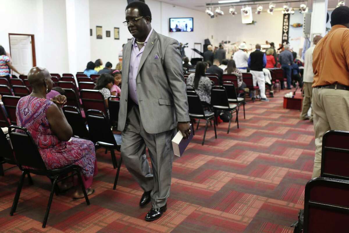 Bible in hand, Jarvis Moore leaves the Victory Gospel Chapel on the East Side following a recent Sunday service. Moore, a convicted murderer, has since dedicated his life preaching to and hiring ex-convicts. A reader says his story reflects the power of redemption.