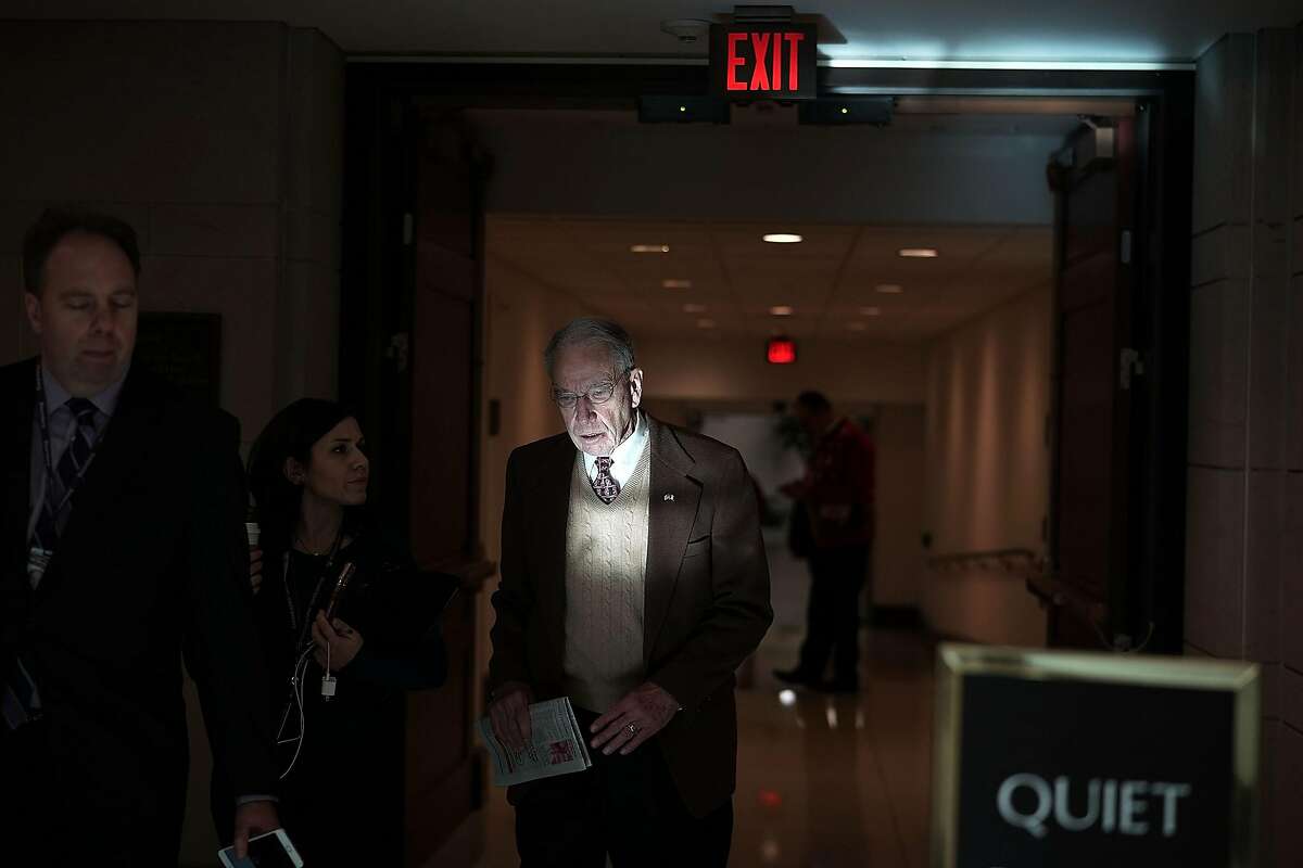 WASHINGTON, DC - DECEMBER 21: U.S. Sen. Chuck Grassley (R-IA) speaks to reporters in a hallway December 21, 2017 on Capitol Hill in Washington, DC. Congress is trying to pass a short term spending bill to fund the government through January 19 and avert a shutdown at midnight on Friday. (Photo by Alex Wong/Getty Images)