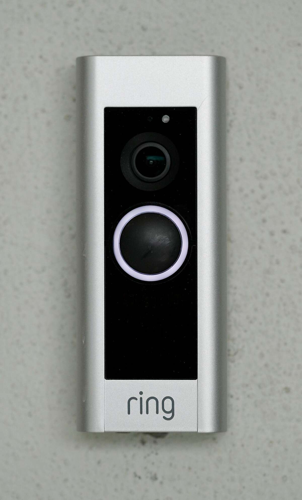 The Ring doorbell is part of the home security system installed by Alice Petty and Jason Hogg in their home in San Francisco, Calif., on Tuesday, December 19, 2017. The couple installed the system in their Glen Park home, and recently capturing video of a porch pirate opening a package and stealing a keyboard they ordered online. The couple installed a Ring video doorbell, two other cameras, and a series of iPads inside so they can monitor the security video, which is stored on a local network storage drive.