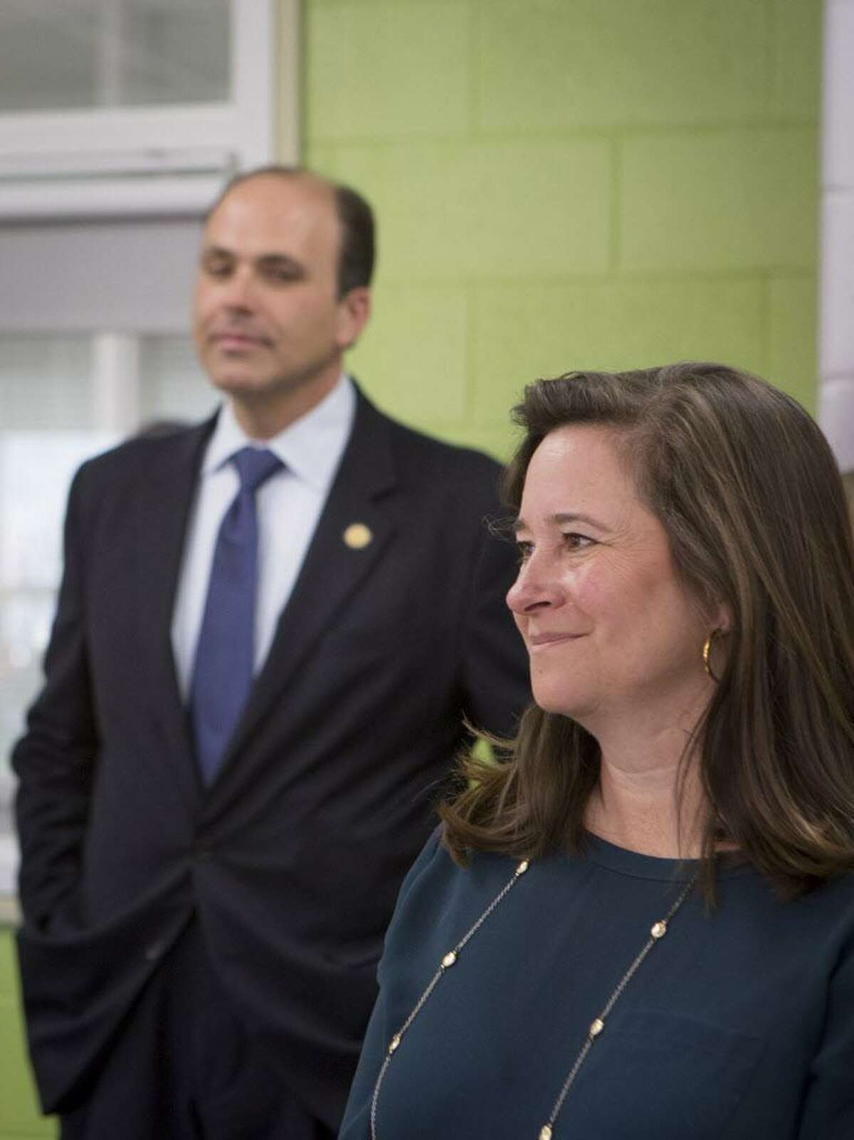 Democrat Shelly Simonds, right, attends a function at Heritage High School in November along with Republican David Yancey.