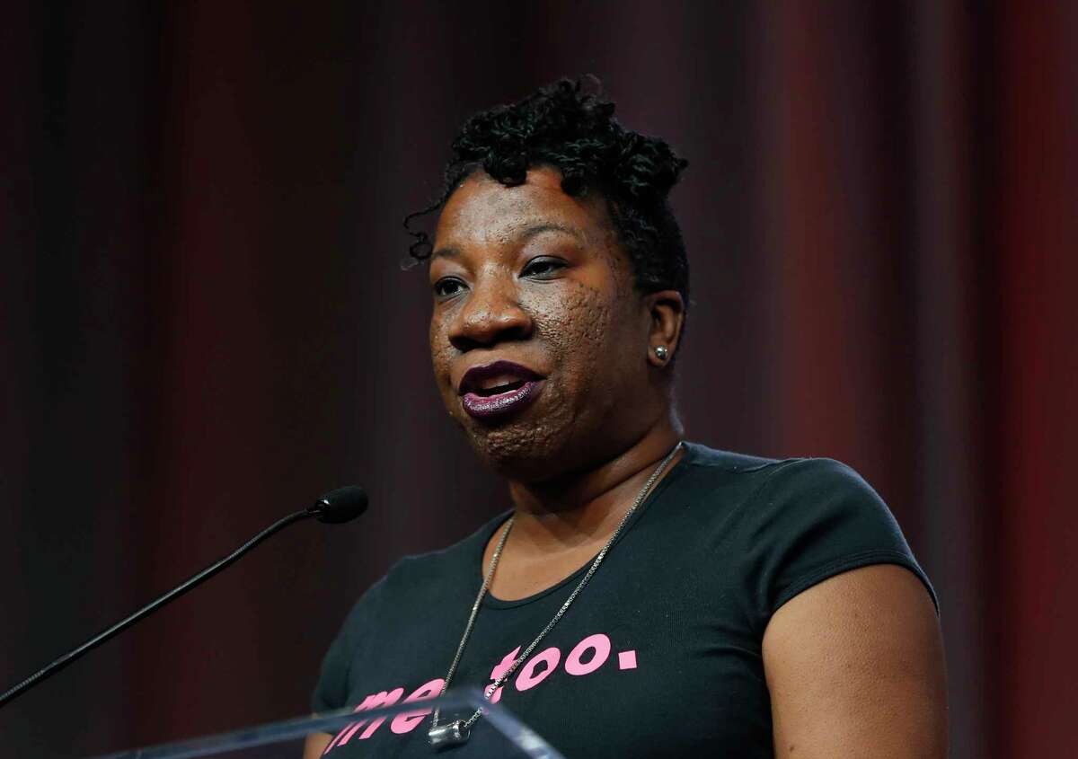 In this Oct. 27, 2017 photo, Tarana Burke, founder, #MeToo Campaign, appears at the Women's Convention in Detroit. Burke, an activist who started the campaign a decade ago to raise awareness about sexual violence, will start this year's ceremonial ball drop at Times Square on New Year's Eve. The Times Square Alliance and Countdown Entertainment say Burke will push the crystal button that officially begins the 60-second countdown to the new year. (AP Photo/Paul Sancya)