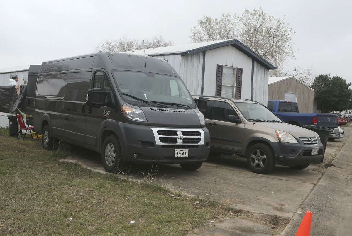 What appears to be a cleaning crew is present Friday December 22, 2017 at a manufactured home on the 100 block of Peach Lane in the Pecan Grove Maufactured Home Community in Schertz, Texas where six-year-old Kameron Prescott was shot. Prescott was shot while inside his home in the 100 block of Peach Lane. Four Bexar County deputies had been chasing a wanted felon in the area, and they opened fire on her as she tried to break into Prescott's home. The woman, who has not been identified, was killed.