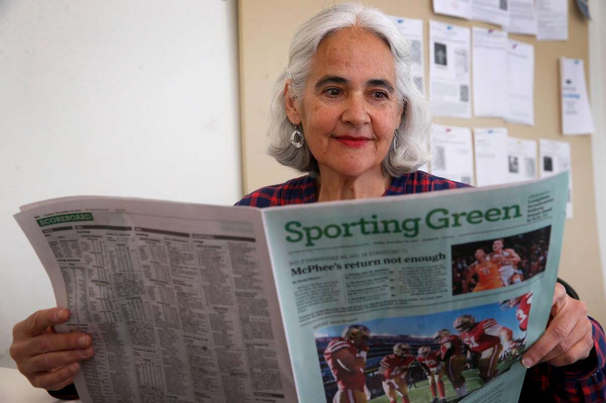Naomi Marcus holds a copy of the Chronicle Sporting Green in San Francisco, Calif. on Friday, Dec. 22, 2017.