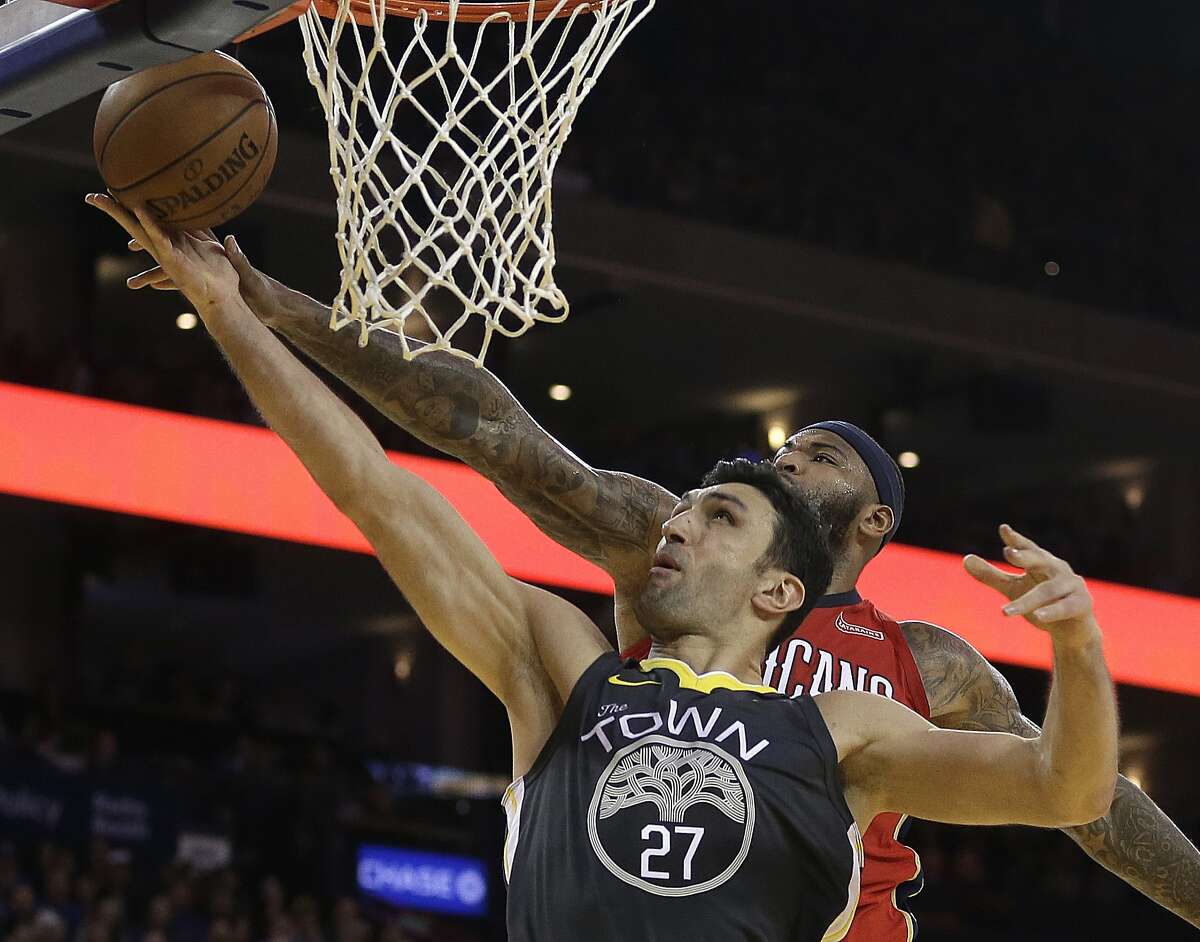 Warriors center Zaza Pachulia (27) sports the tree-emblazoned "The Town" jersey on Nov. 25 against the New Orleans Pelicans. Golden State will wear the Town and the tree for the second time on Saturday during a home game against the Denver Nuggets.