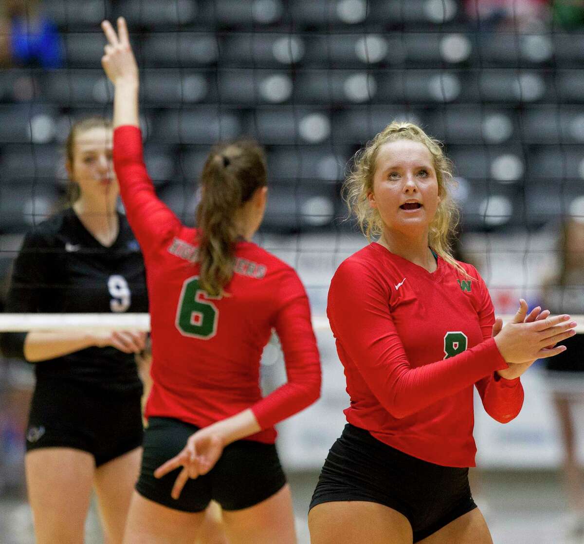 The Woodlands setter Sophie Walls (8) looks up at the scoreboard during the second set of a Class 6A semifinal volleyball match at the UIL state tournament, Friday, Nov. 17, 2017, in Garland.