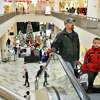 George Weiderkehr of Princetown and his son Hans, 8, do some last minute holiday shopping at Crossgates Mall Saturday Dec. 23, 2017 in Guilderland, NY. (John Carl D'Annibale / Times Union)
