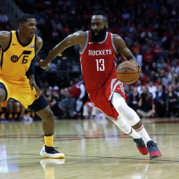 1of 2houston rockets guard james harden 13 drives around utah jazz guard joe johnson 6 during the second half of an nba basketball game at toyota center - Nba Christmas Day 1of 2houston rockets guard james harden 13 drives around utah jazz guard joe johnson 6 during the second half of an nba basketball game at toyota center - Nba Christmas Day