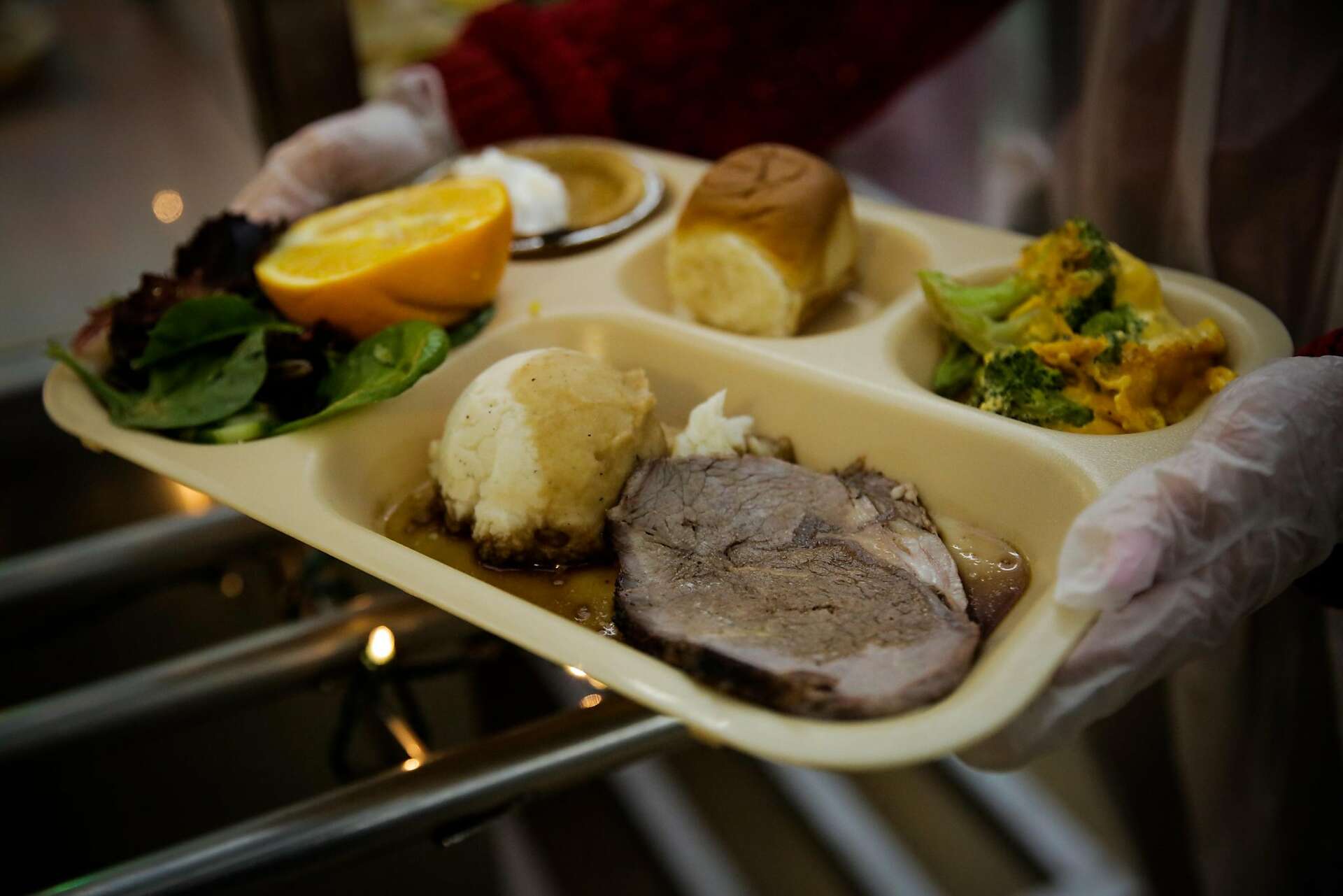 Hundreds enjoy donated prime rib lunch for Christmas Eve at Glide Memorial