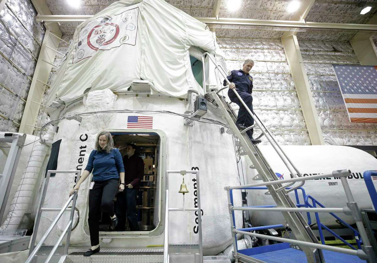 Dan Heidenreich, right, on the stairs from NASA's Human Exploration Research Analog (HERA) at Johnson Space Center. ﻿ HERA is designed for isolation, confinement and remote conditions in exploration scenarios.﻿