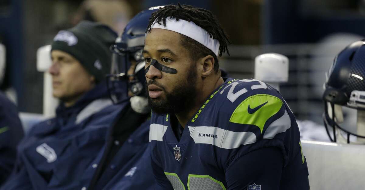 Seattle Seahawks free safety Earl Thomas sits on the bench in the second half of an NFL football game against the Los Angeles Rams, Sunday, Dec. 17, 2017, in Seattle. (AP Photo/Elaine Thompson)