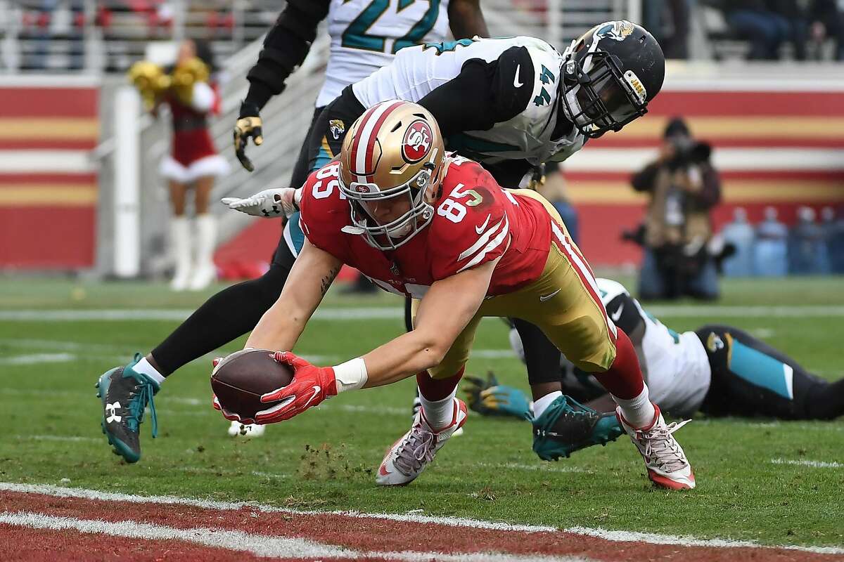 SANTA CLARA, CA - DECEMBER 24: George Kittle #85 of the San Francisco 49ers dives into the end zone for a touchdown against the Jacksonville Jaguars during their NFL game at Levi's Stadium on December 24, 2017 in Santa Clara, California. (Photo by Robert Reiners/Getty Images) ***BESTPIX***