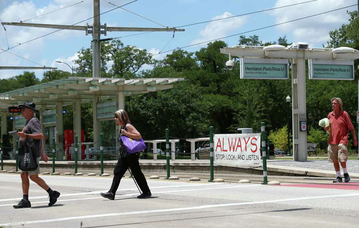 Metropolitan Transit Authority, Rice University and the City of Houston collaborated to make the crosswalk at the Hermann Park / Rice train stop safer, adding signs and painting the train tracks sections red, as seen on July 26.