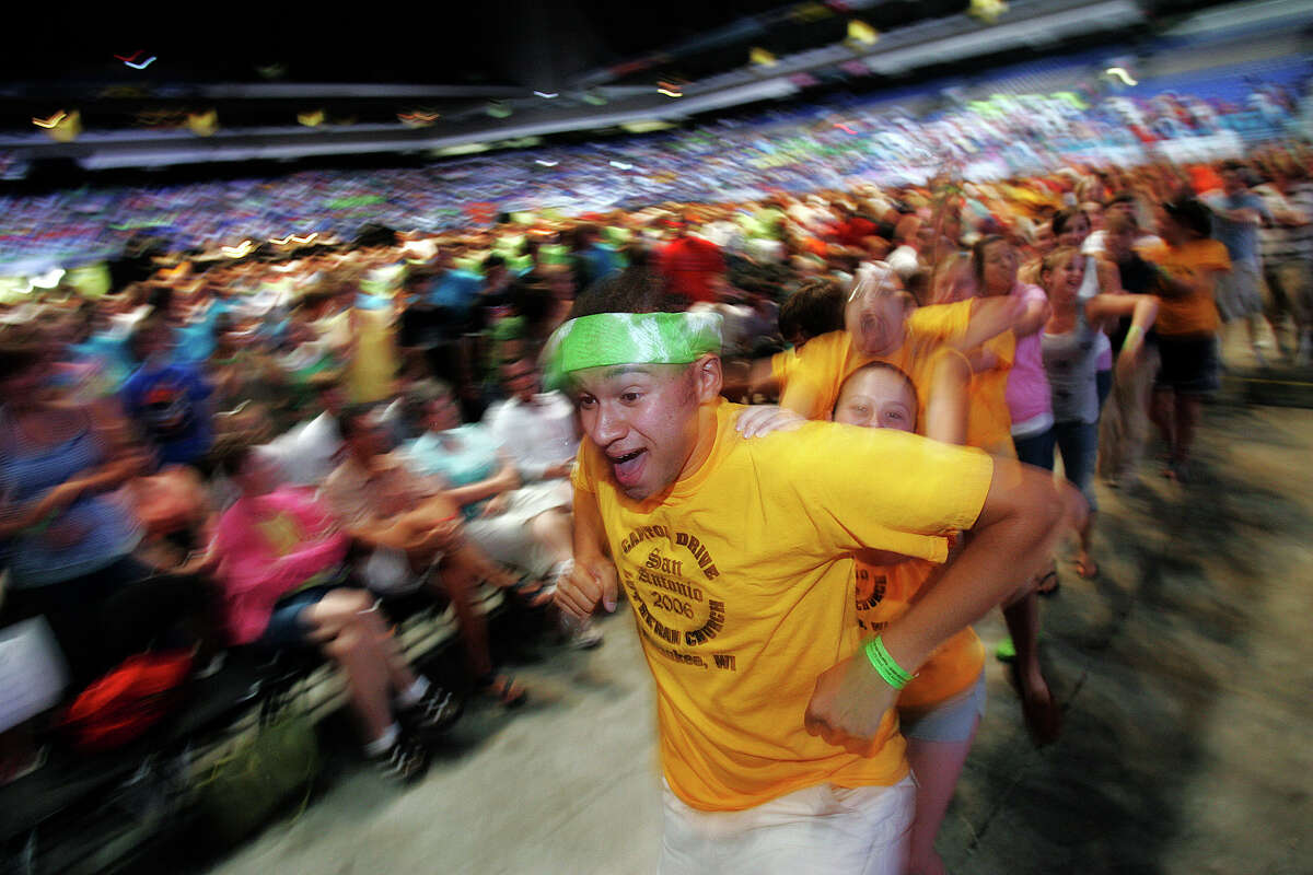 Thousands of young people age 14-18 years gather for the Evangelical Lutheran Church of America (ELCA) Youth Gathering at the Alamodome on Wednesday, July 5, 2006. This marks the second time ELCA has been held here with an expected 20,000 young people gathered to fellowship with others of their faith.