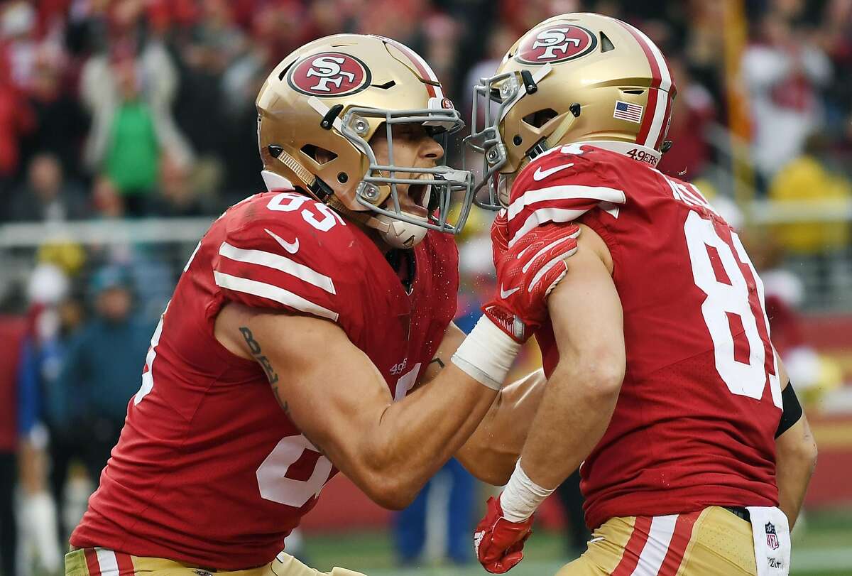 SANTA CLARA, CA - DECEMBER 24: Trent Taylor #81 and George Kittle #85 of the San Francisco 49ers celebrates after Taylor caught a touchdown pass against the Jacksonville Jaguars during their NFL football game at Levi's Stadium on December 24, 2017 in Santa Clara, California. (Photo by Thearon W. Henderson/Getty Images)