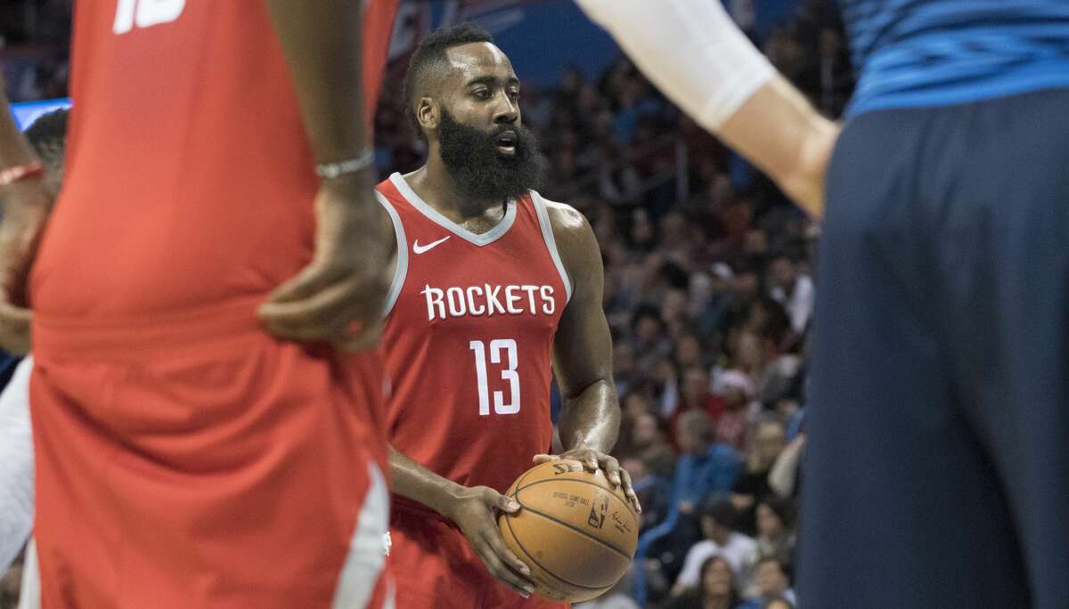 OKLAHOMA CITY, OK - DECEMBER 25: James Harden #13 of the Houston Rockets shoots a free throw agains the Oklahoma City Thunder during the second half of a NBA game at the Chesapeake Energy Arena on December 25, 2017 in Oklahoma City, Oklahoma. The Thunder defeated the Rockets 112-107. NOTE TO USER: User expressly acknowledges and agrees that, by downloading and or using this photograph, User is consenting to the terms and conditions of the Getty Images License Agreement. (Photo by J Pat Carter/Getty Images)