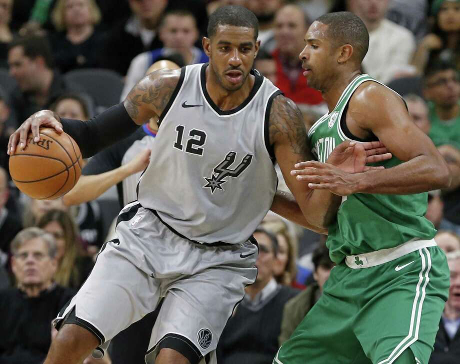 LaMarcus Aldridge and the Spurs split their two games with Al Horford and the Celtics. Photo: Photos By Edward A. Ornelas / San Antonio Express-News / © 2017 San Antonio Express-News
