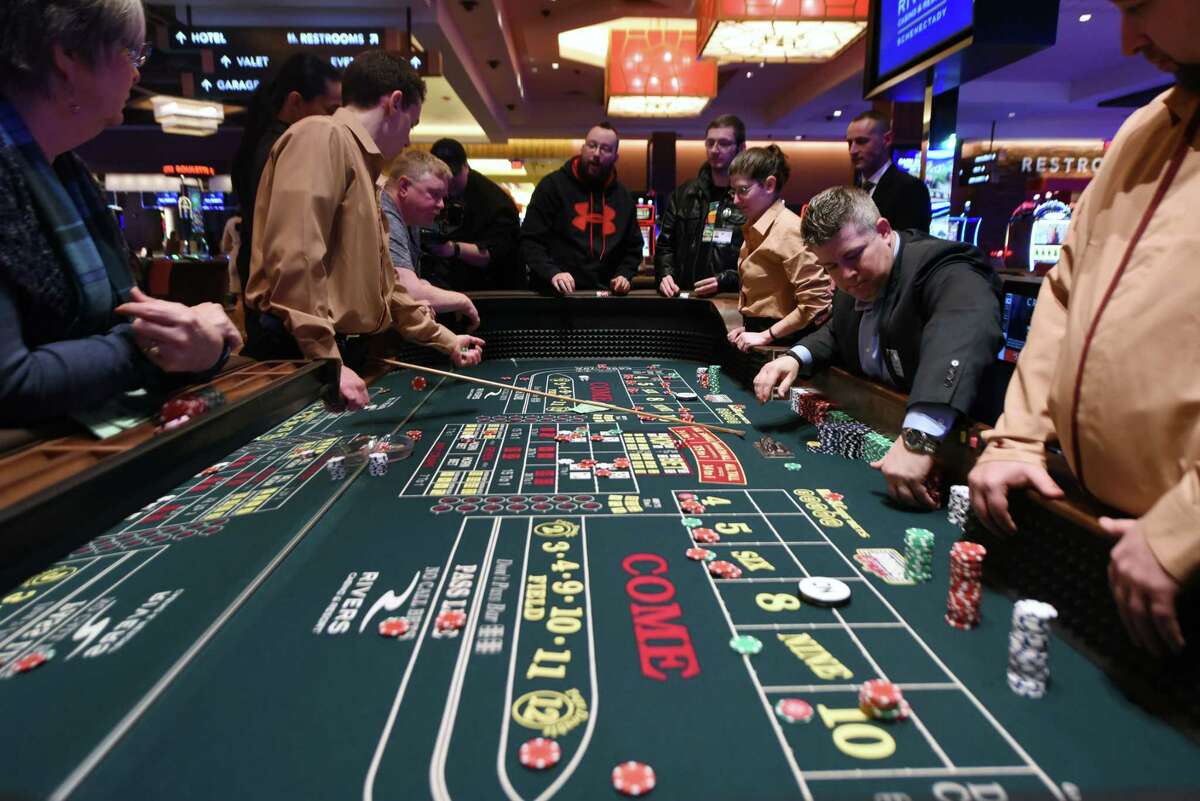 Players at a craps table in Rivers Casino & Resort Schenectady on Wednesday, Feb. 1, 2017, in Schenectady, N.Y. The game was used as a training exercise for casino employees. (Will Waldron/Times Union)