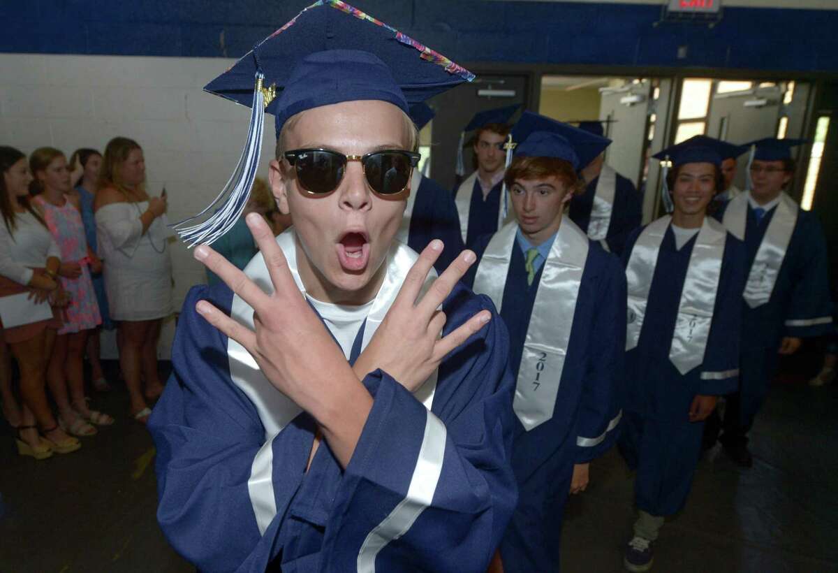Emil Almhojd celebrates as the Staples High School Class of 2017 prepares for commencement exercises on June 22.