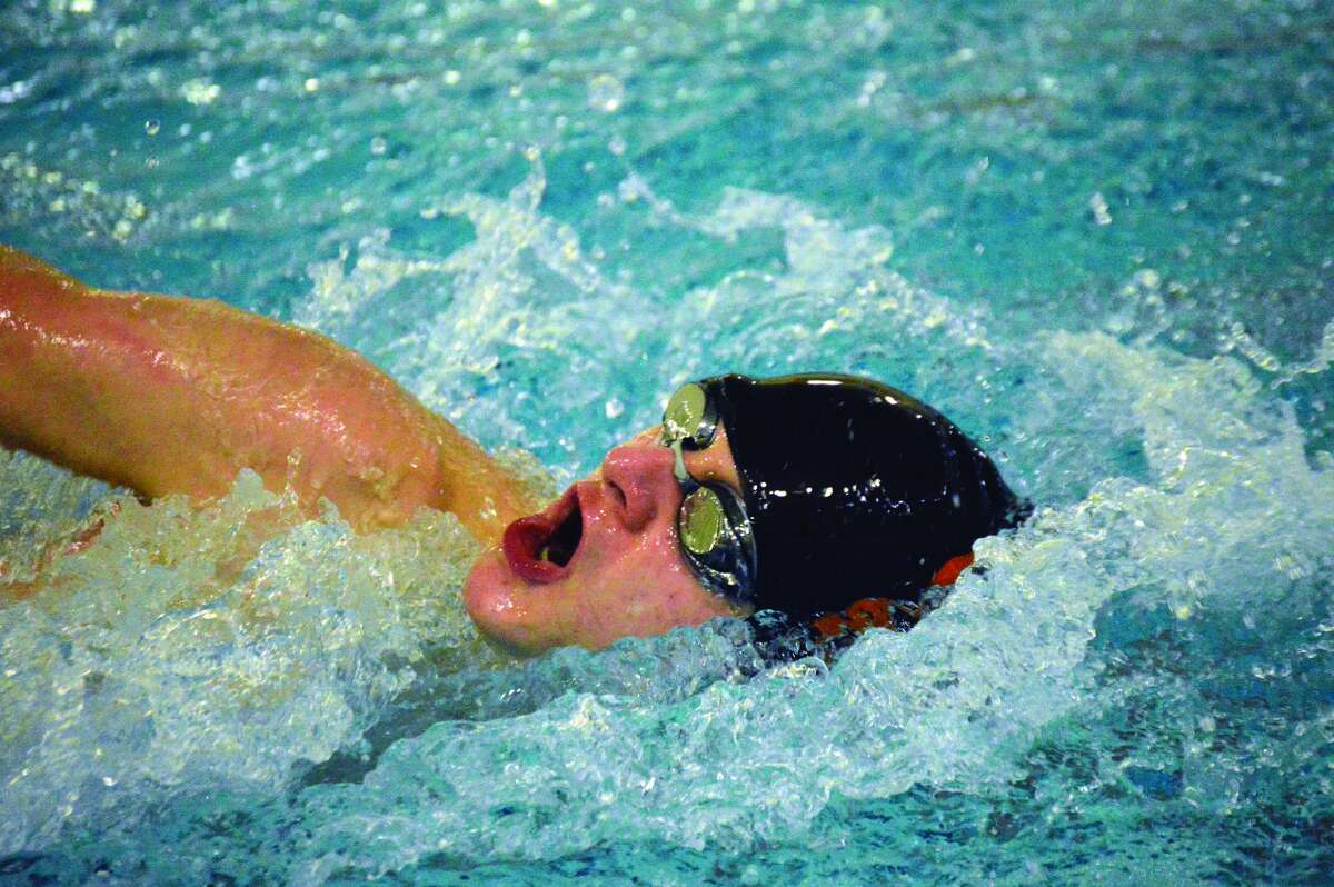 Edwardsville’s Nathan Zickuhr competes in the 200-yard individual medley. He finished second in the event with a time of 2:32.46.
