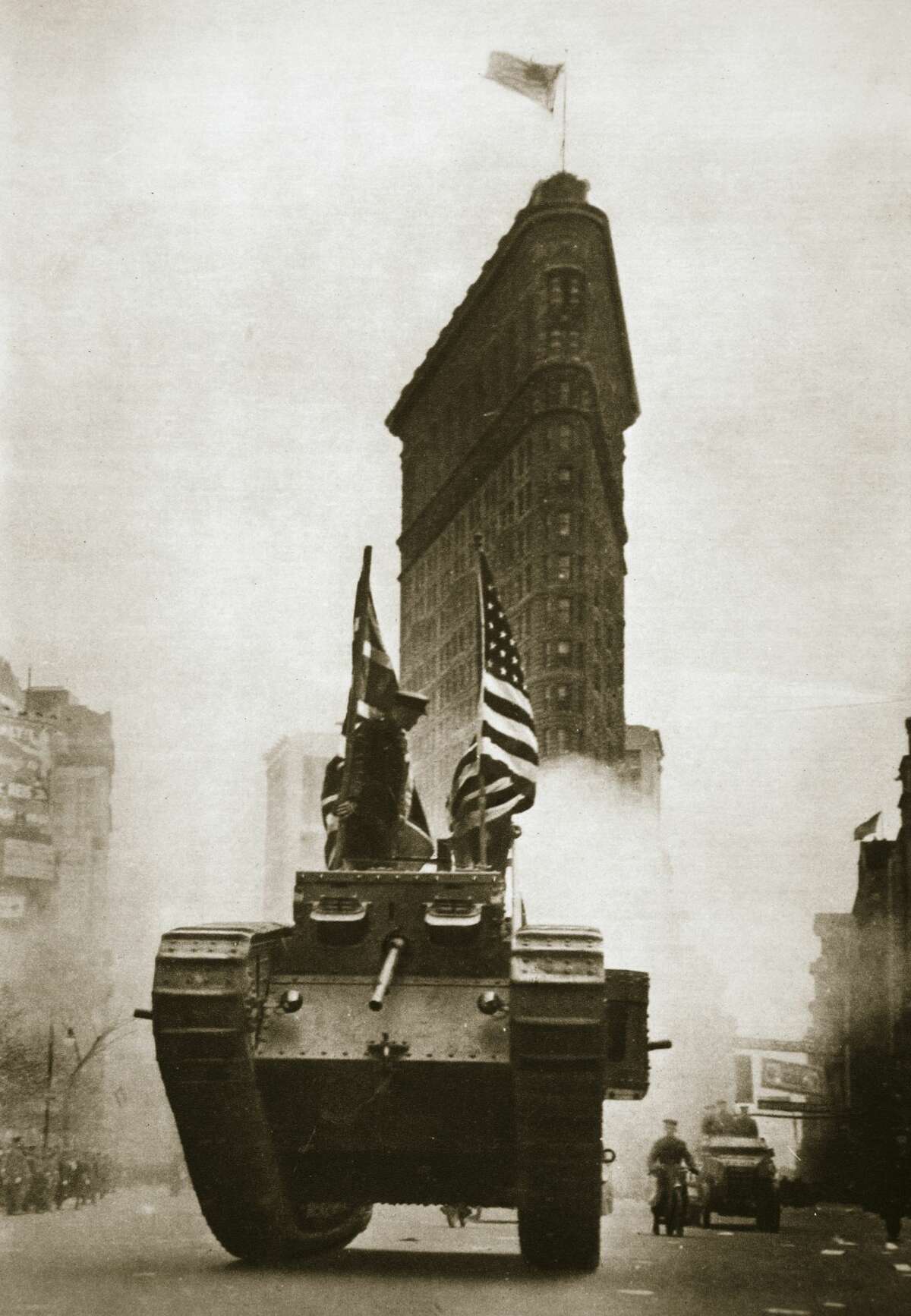 British tank 'Britannia' on Fifth Avenue, New York City, circa 1918. The tank was in New York to aid the Liberty Loan drive. Liberty Loans were war bonds sold in the United States from 1917-1918 to support the allied war effort. Americans were encouraged to buy the bonds as their patriotic duty and they raised around $17 billion.