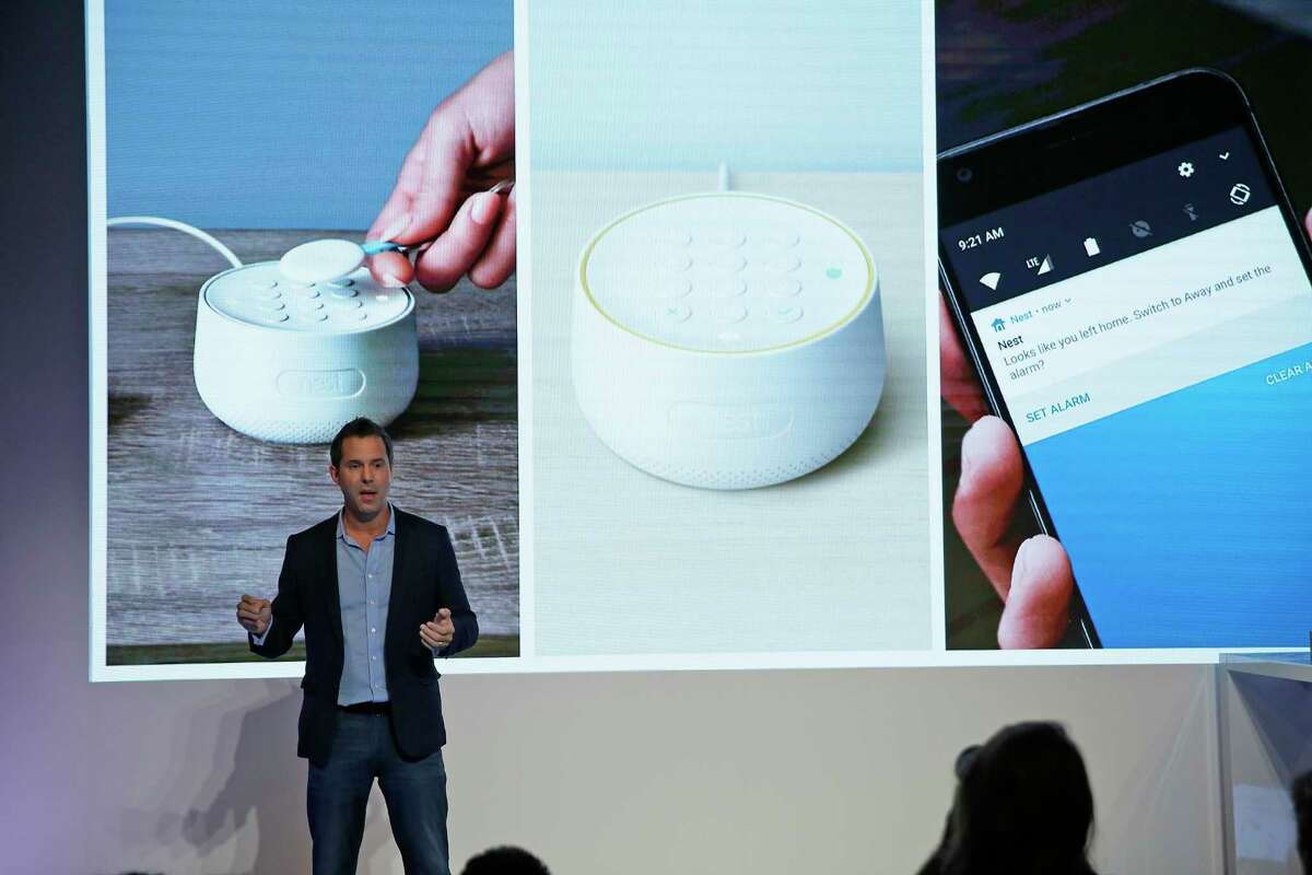FILE - In this Wednesday, Sept. 20, 2017, file photo, Maxime Veron, head of product marketing for Nest Labs, talks about the features of the Nest Secure alarm system during an event in San Francisco. As people get voice-activated speakers and online security cameras for convenience and peace of mind, are they also giving hackers a key to their homes? Many devices from reputable manufacturers have safeguards built in, but safeguards aren?’t the same as guarantees. (AP Photo/Eric Risberg, File)